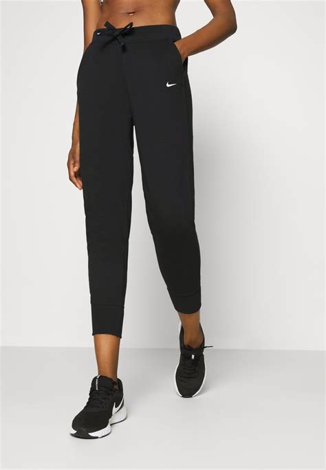 sporthose damen lang weites bein nike|Lange Nike Sporthosen machen sportlichen Frauen Beine .